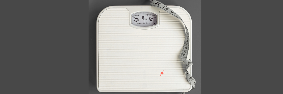Bathroom scale with measuring tape symbolizing weight struggles before starting keto